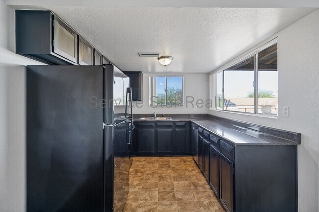 13027 N 28TH Place photo 3