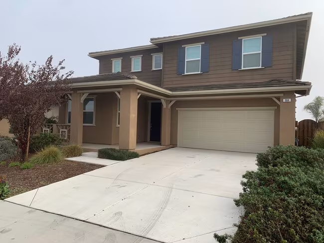 Beautiful 5 Bedroom, 3 Bath Oakley Home / Downstairs Bedroom photo 2
