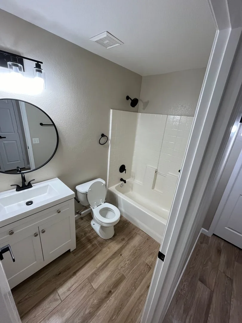 Johnson Ranch, 3 bed, 2 bath, single story, remodeled: wood tile flooring photo 4