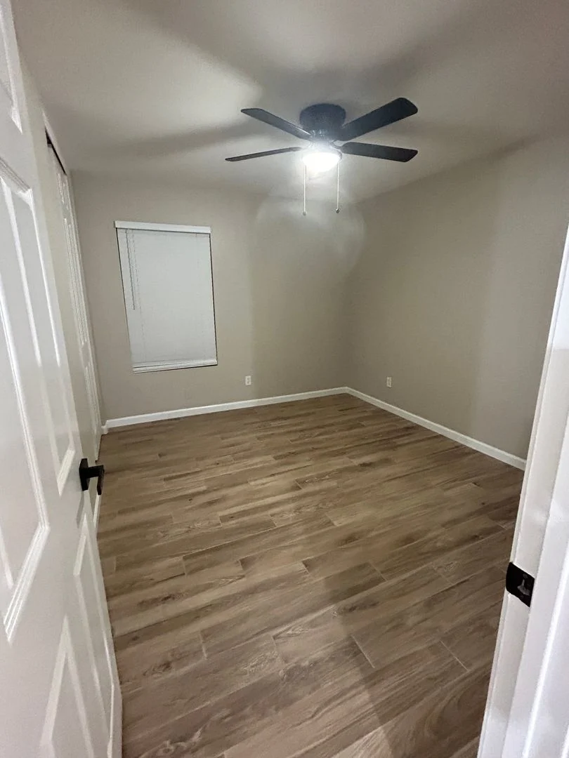 Johnson Ranch, 3 bed, 2 bath, single story, remodeled: wood tile flooring photo 2