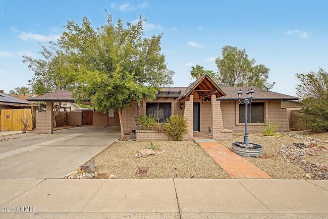 6616 W Aire Libre Ave photo 3