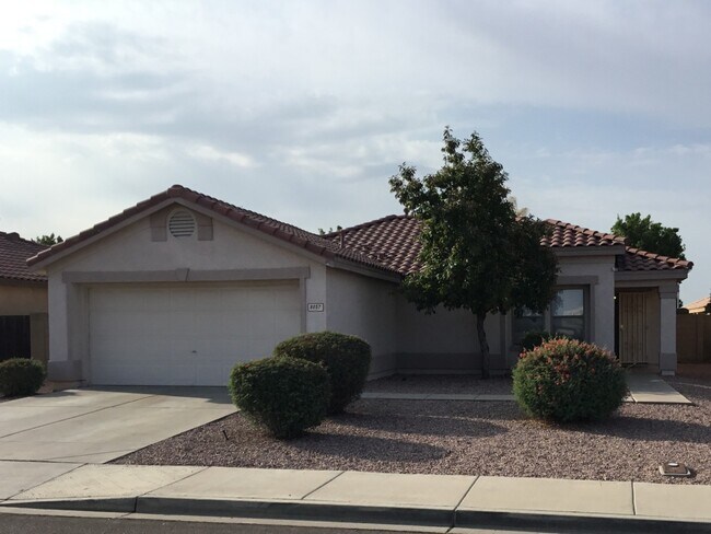 8057 W Hatcher Rd photo 2