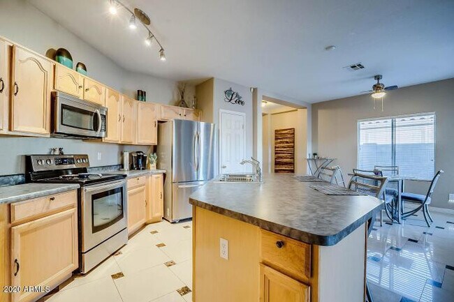 14833 W Charter Oak Rd photo 4