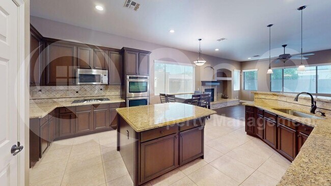 9648 E Lobo Ave photo 5
