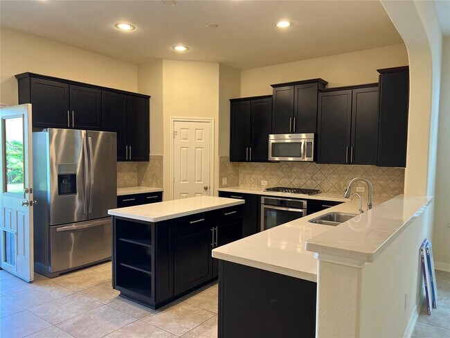 10306 Hartfield Bluff Lane, Cypress, TX 77433 photo 2