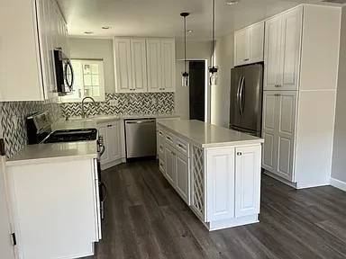 Townhouses on 12th Ave · Whitestone photo 4