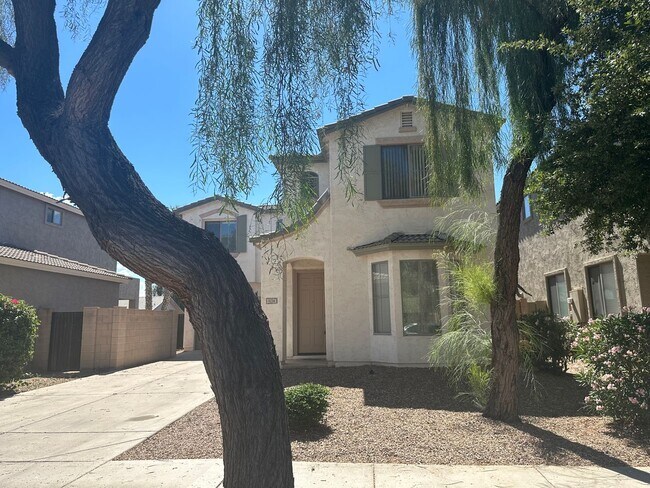 EXTRA PARKING WITH 2 CAR GARAGE AND EXTENDED DRIVEWAY