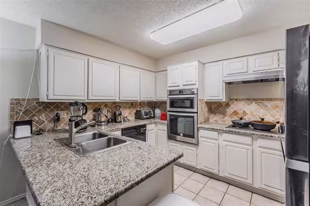 3912 St Christopher Ln Dallas, TX 75287 photo 5