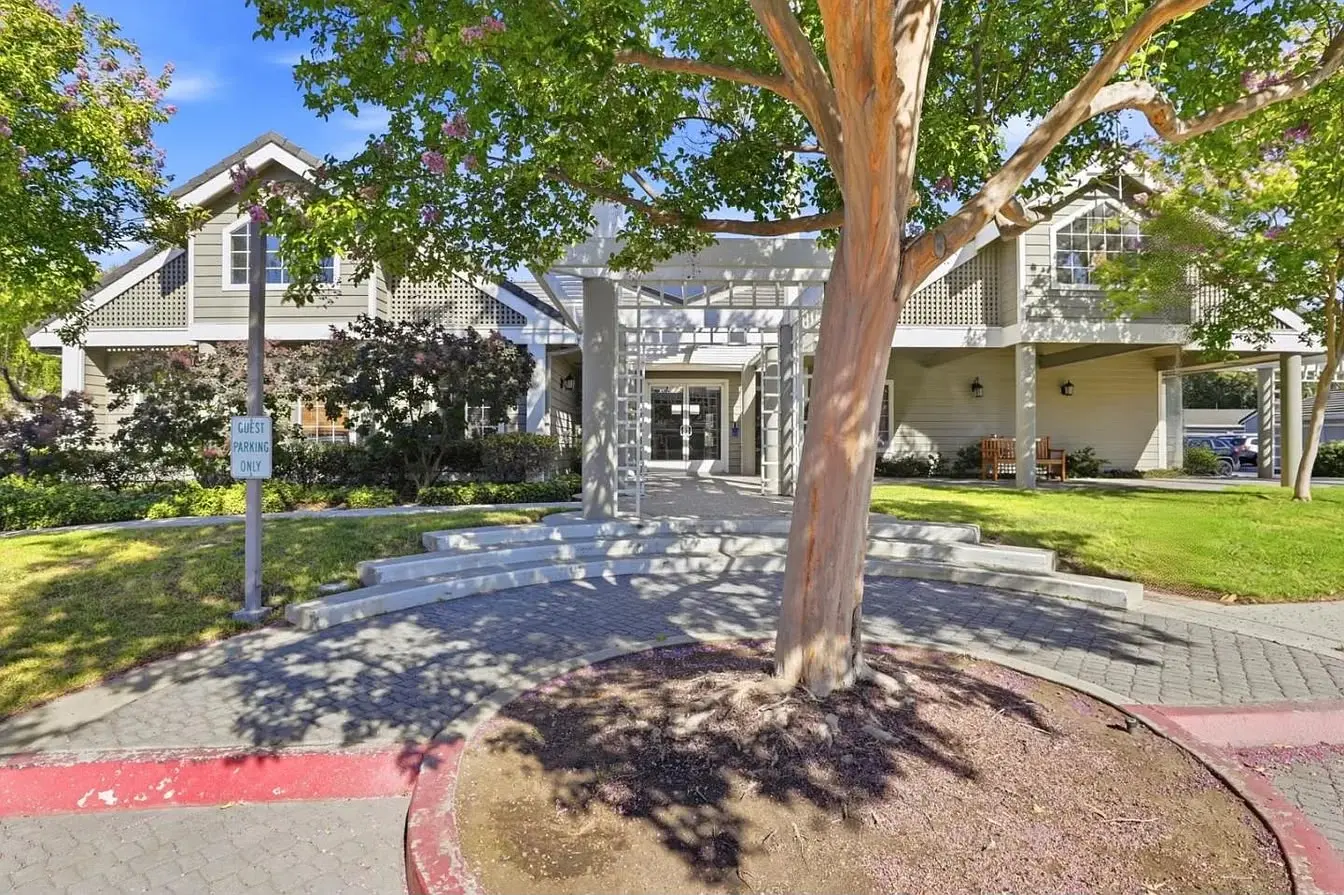 Surrounded By Mature Trees And Beautifully Maintained Grounds, This Inviting Residence Offers A Wond photo 2