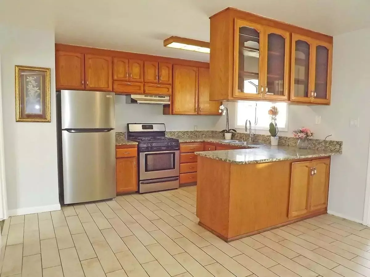 Updated Three Bedroom Gem With Gorgeous Hardwood Floors photo 4