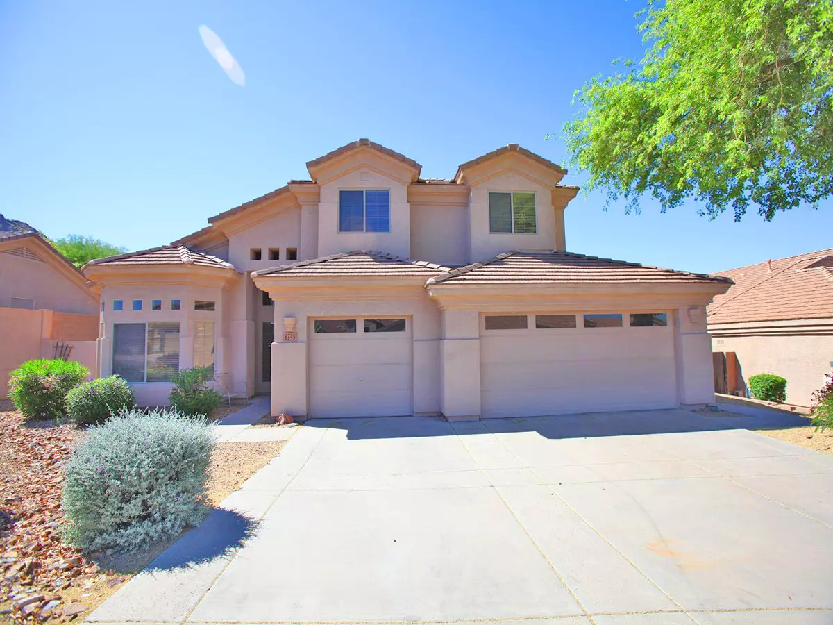 6345 W Rowel Rd photo 3