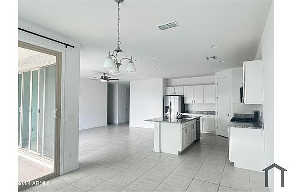 11241 E Ulysses Ave photo 4