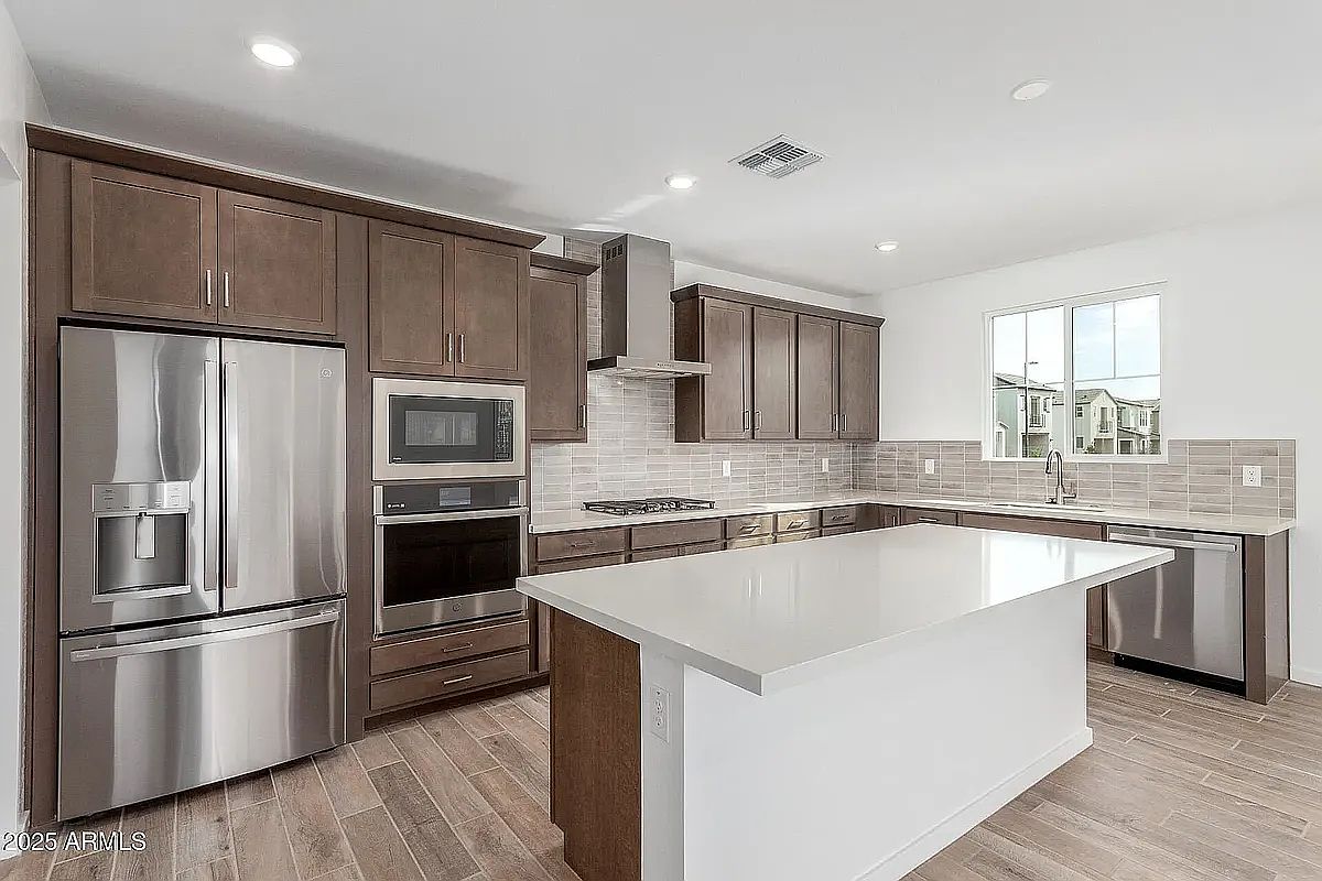 2488 W Rowel Rd photo 4