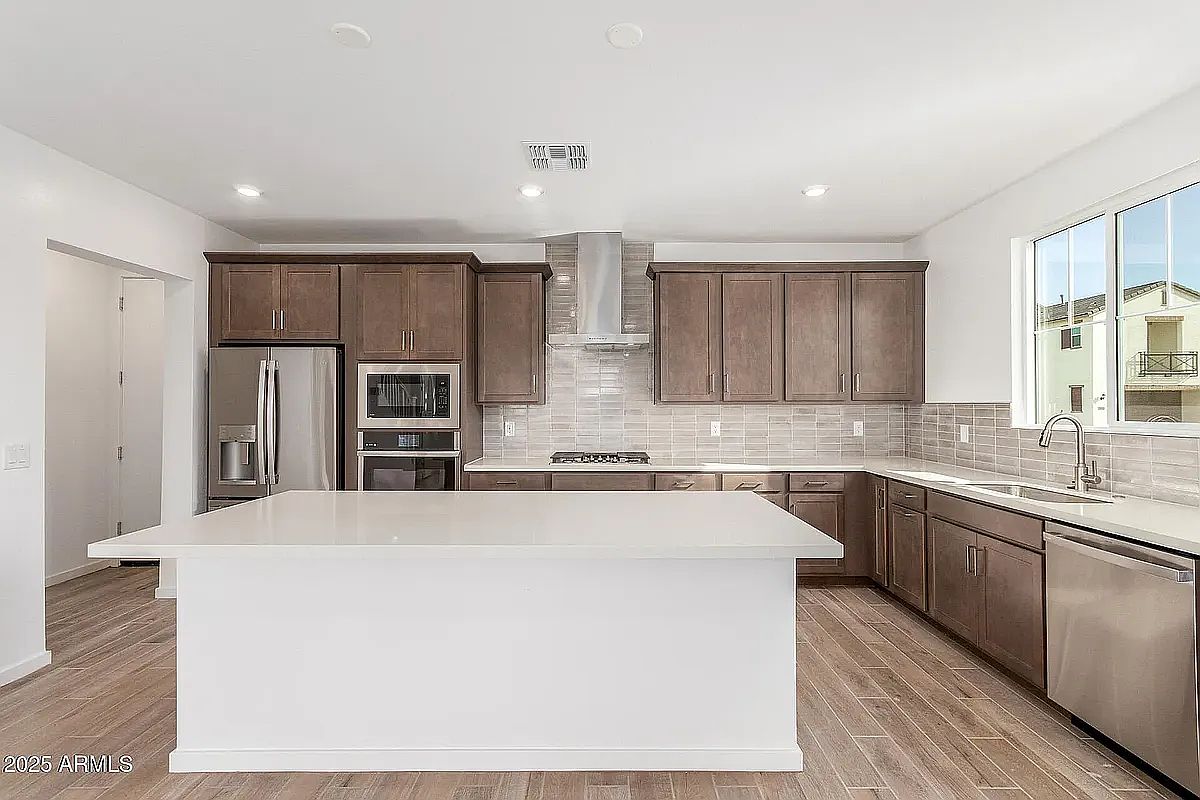 2488 W Rowel Rd photo 3
