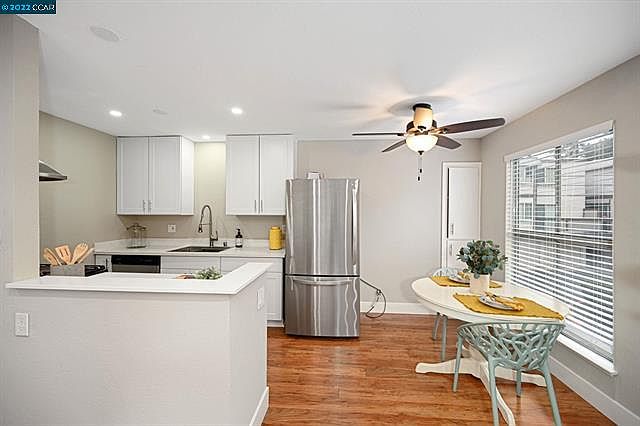 Well-Maintained 2-Bedroom Condo | Garage + Patio + Pool photo 3