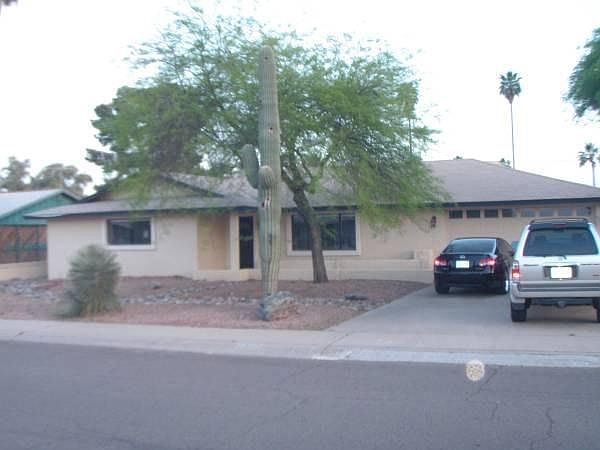 7037 E Belleview St photo 2