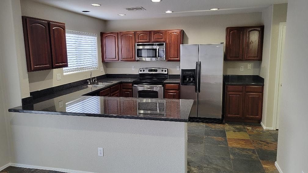 25857 W Burgess Ln photo 3