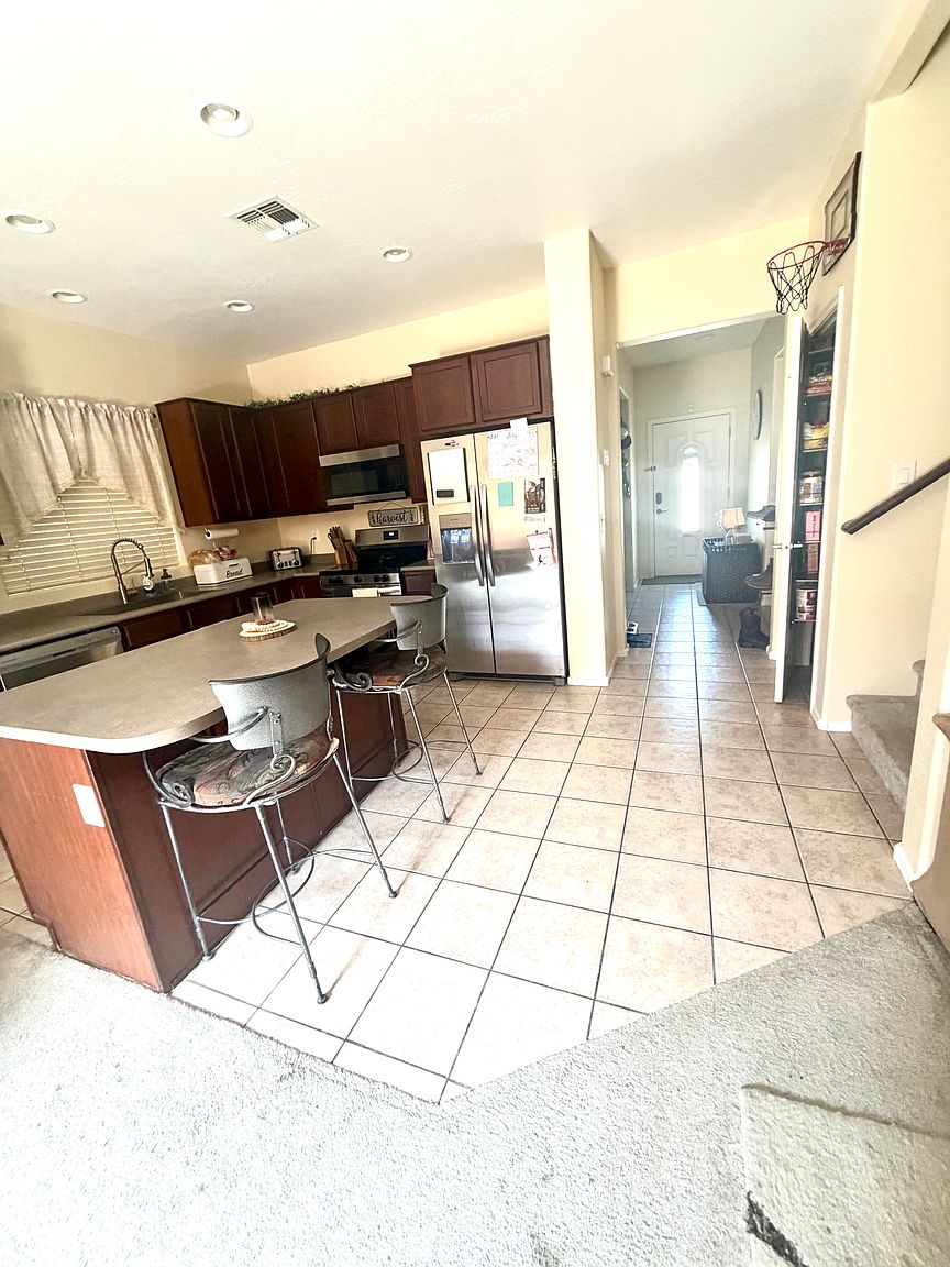 14169 W Country Gables Dr photo 3