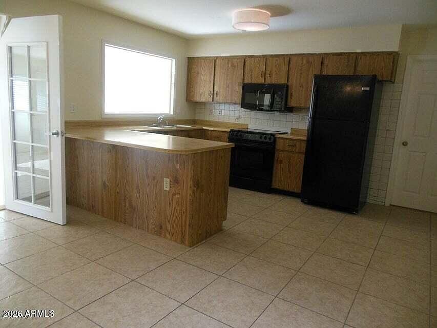 7203 W Hatcher Rd photo 2
