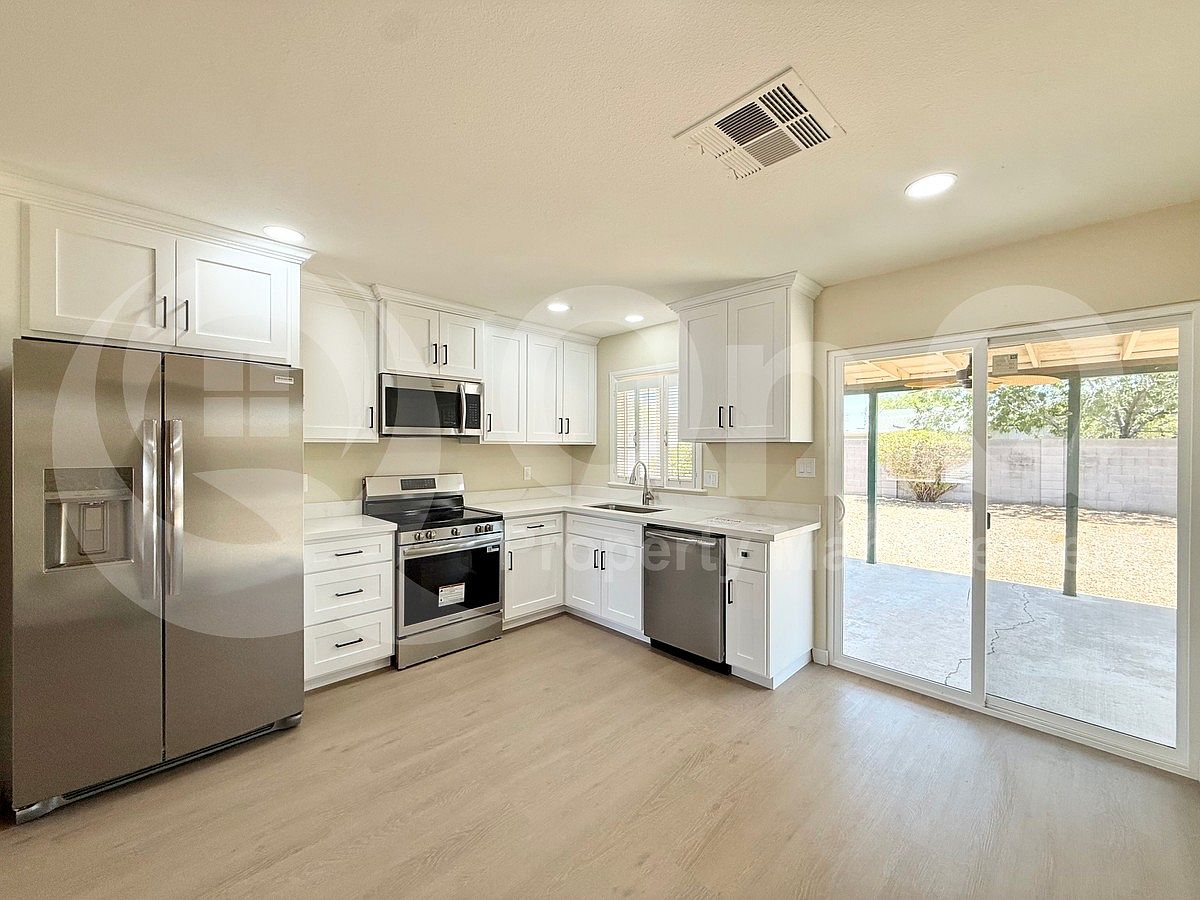 2465 E John Cabot Rd photo 5